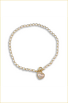 Pearl and gold bead necklace with heart pendant.